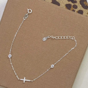 Pulseira Cruz e Ponto de Luz